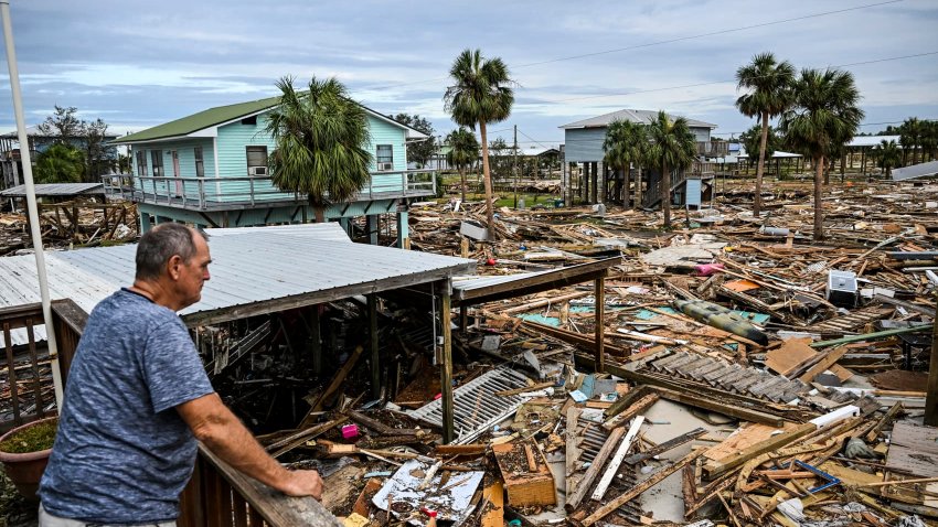 David Hester inspects damages of his house after Hurricane Helene made landfall in Horseshoe Beach, Florida, on September 28, 2024. 