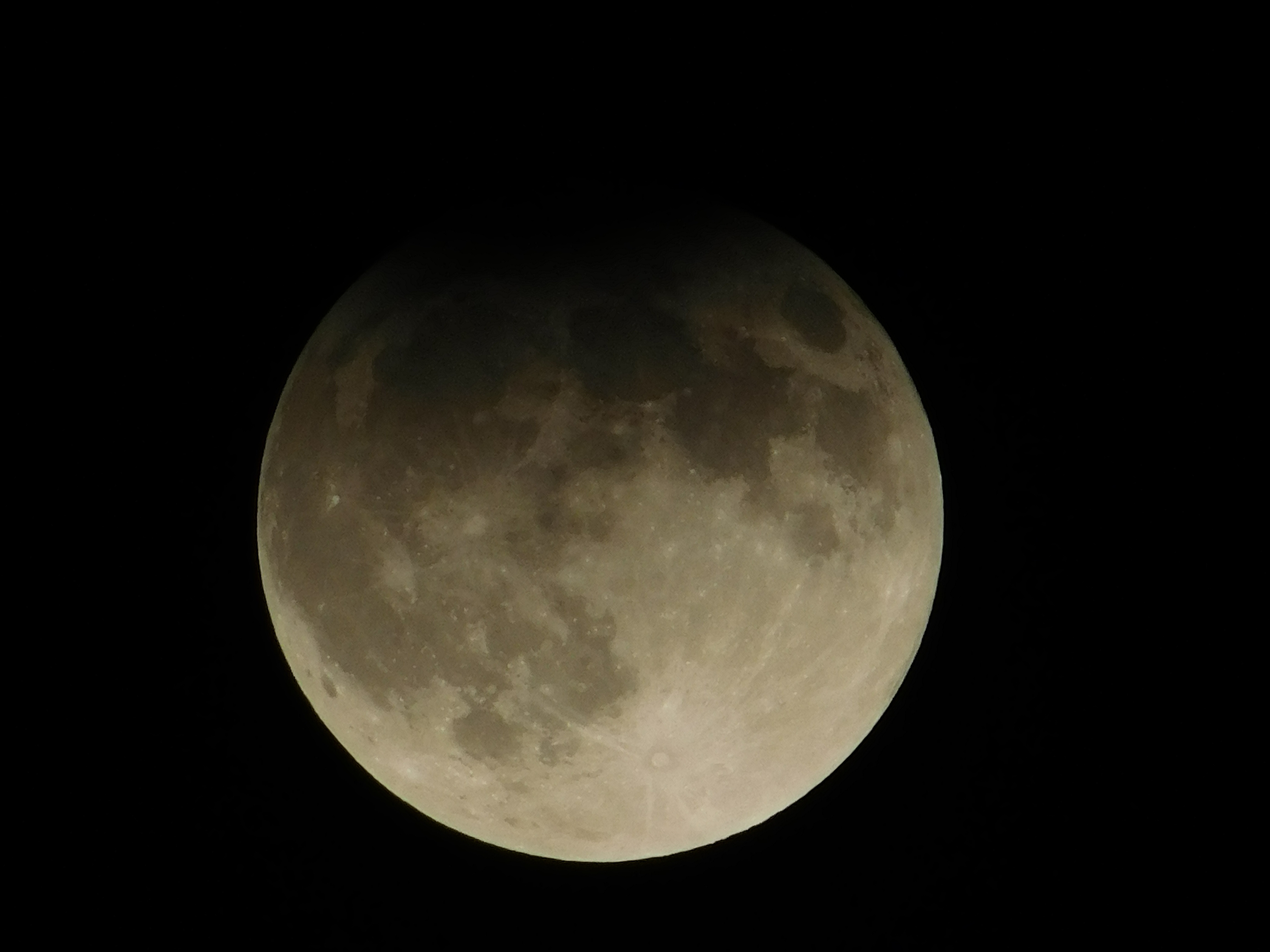 Photos capture partial lunar eclipse of Harvest supermoon – NBC 5 ...
