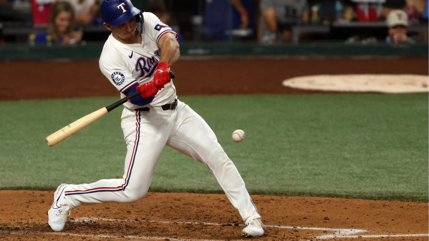 ARLINGTON, TX – SEPTEMBER 4: Wyatt Langford #36 of the Texas Rangers hits a run scoring double against the New York Yankees during the fourth inning at Globe Life Field on September 4, 2024 in Arlington, Texas.