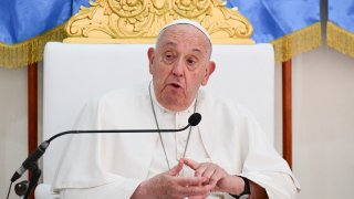 Pope Francis speaks during his visit to the Irmas Alma School.