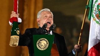 Mexican President Andres Manuel Lopez Obrador attends his last public act as president at the ‘Grito de Independencia’ ceremony, which marks the start of Independence Day celebrations at El Zocalo Square in Mexico City on September 15, 2024.