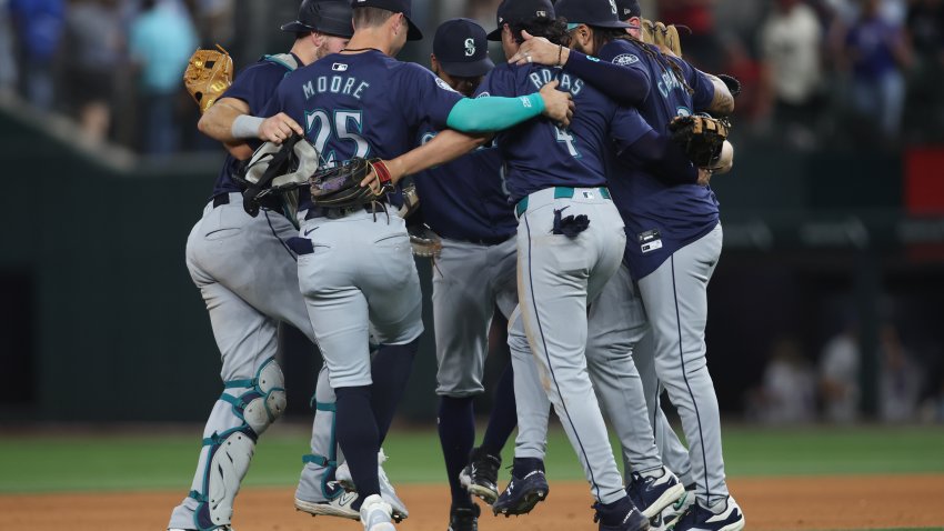 Sep 20, 2024; Arlington, Texas, USA; Seattle Mariners players celebrate after winning against the Texas Rangers at Globe Life Field. Mandatory Credit: Tim Heitman-Imagn Images