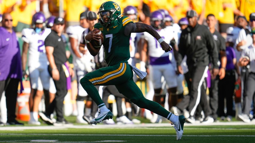 Aug 31, 2024; Waco, Texas, USA;  Baylor Bears quarterback Dequan Finn (7) runs the ball for a touchdown against the Tarleton State Texans during the first half at McLane Stadium. (Mandatory Credit: Chris Jones-USA TODAY Sports)