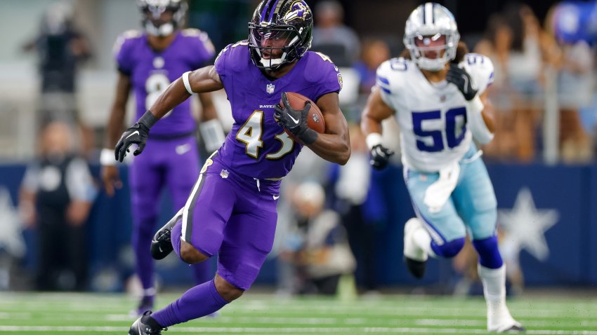 Sep 22, 2024; Arlington, Texas, USA; Baltimore Ravens running back Justice Hill (43) runs with the ball during the second quarter against the Dallas Cowboys at AT&T Stadium. Mandatory Credit: Andrew Dieb-Imagn Images