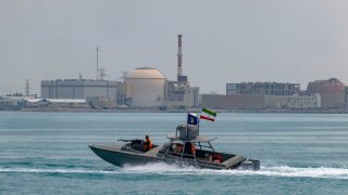 An Islamic Revolutionary Guard Corps (IRGC) speed boat is sailing along the Persian Gulf during the IRGC marine parade to commemorate Persian Gulf National Day, near the Bushehr nuclear power plant in the seaport city of Bushehr, Bushehr province, in the south of Iran, on April 29, 2024.