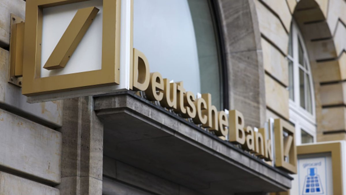 Deutsche Bank swings back to profit in the third quarter, beating