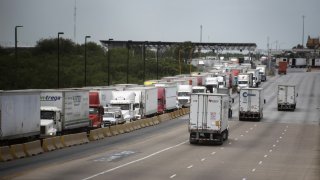 Trucks traveling across the World Trade International Bridge in Laredo, Texas, U.S.