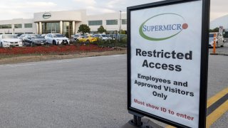 A informational sign at the entrance to Super Micro Computer Inc. headquarters in San Jose, California, U.S., on Tuesday, Jan. 5, 2021.