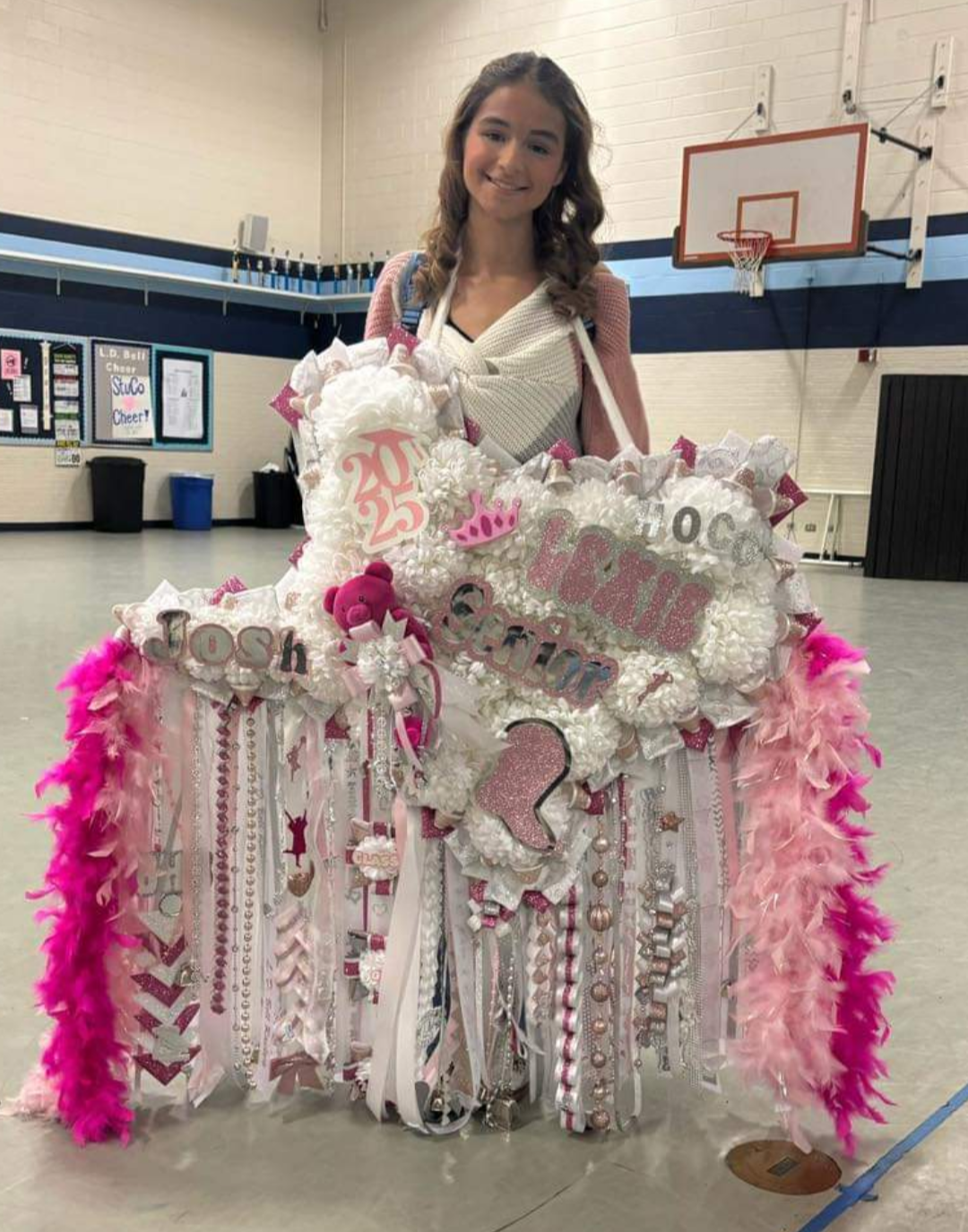 This is Lexie Rimpley a Senior at L. D. Bell high School. Lexie is on the drill team, IB student, member of the national Honor society and national high School scholars. Lexie had a dream for this mega Texas mum and this mama made it come true.