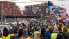 Dockworkers go on strike at ports from Maine to Texas, sparking fears of shortages and higher prices