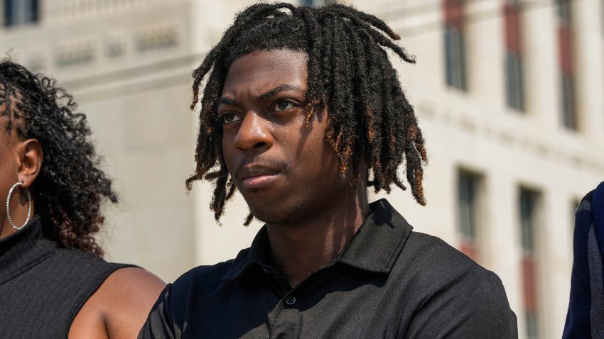 HOUSTON, TEXAS – MAY 23: Darryl George, 18, stands next to his mother, Darresha George in front of Galveston County Court House on Thursday, May 23, 2024, in Galveston, Texas.  A hearing was set to be held Thursday in a federal lawsuit a George filed against his Texas school district over his punishment for refusing to change his hairstyle. (Raquel Natalicchio/Houston Chronicle via Getty Images)