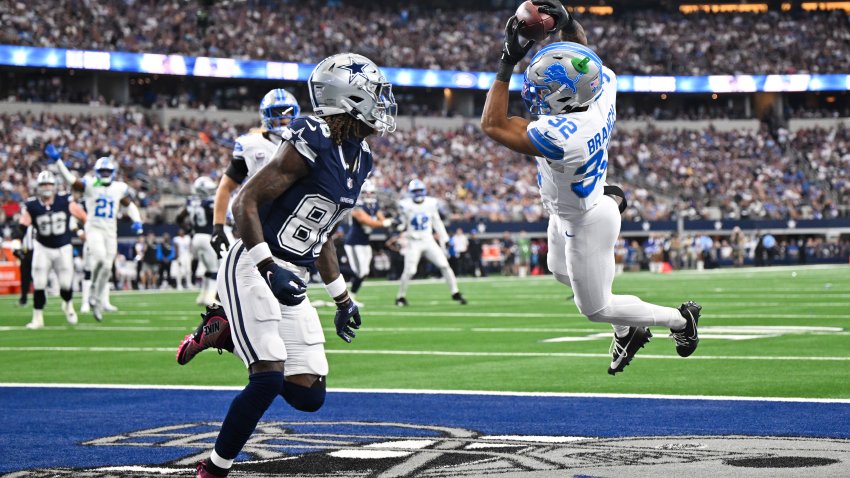 ARLINGTON, TEXAS – OCTOBER 13: Brian Branch #32 of the Detroit Lions intercepts a pass in the endzone during the first quarter of a game against the Dallas Cowboys at AT&T Stadium on October 13, 2024 in Arlington, Texas. (Photo by Sam Hodde/Getty Images)