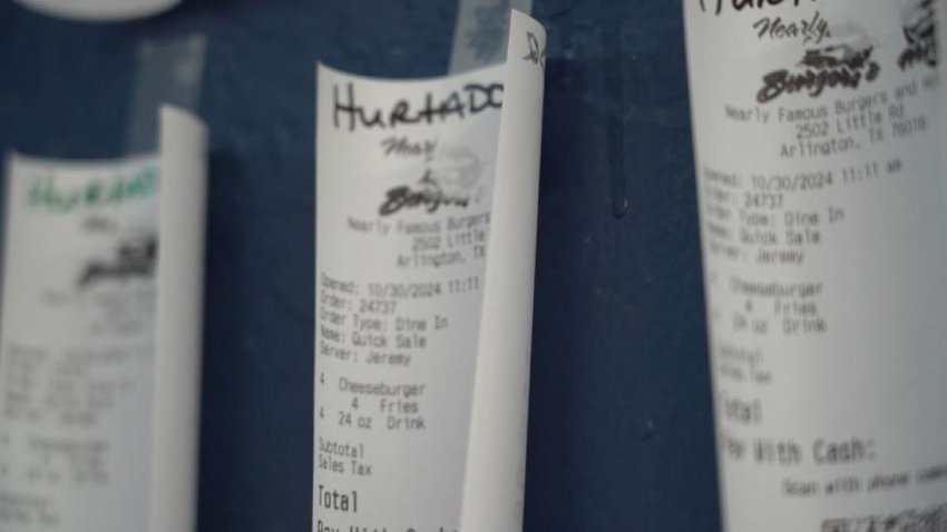 The Pay it Forward Wall at Nearly Famous Burgers and Hotdogs in Arlington got a much-needed boost from local restaurant owner Brandon Hurtado. (NBC 5 photo)