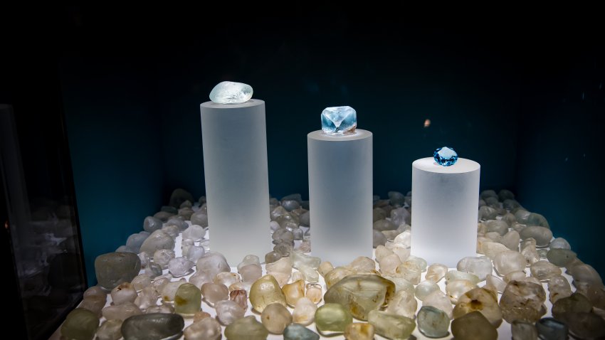 Texas Topaz (center) and other assorted topaz in the Perot Museum exhibit