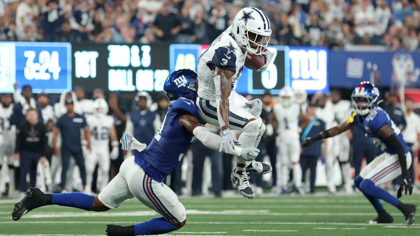 Sep 26, 2024; East Rutherford, New Jersey, USA; New York Giants safety Tyler Nubin (31) tackles Dallas Cowboys wide receiver Brandin Cooks (3) during the first quarter at MetLife Stadium. (Mandatory Credit: Brad Penner-Imagn Images)