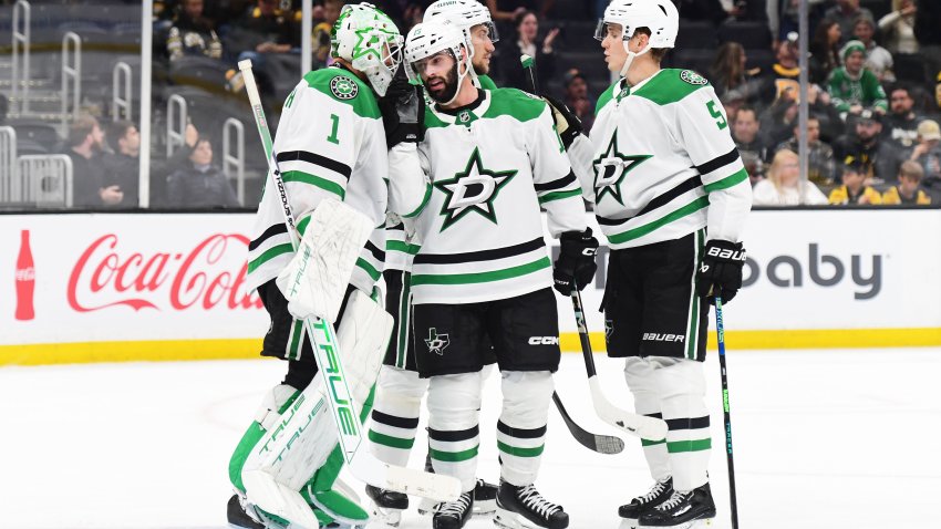 Oct 24, 2024; Boston, Massachusetts, USA;  Dallas Stars goaltender Casey DeSmith (1) and center Colin Blackwell (15) congratulate each other after defeating the Boston Bruins at TD Garden. Mandatory Credit: Bob DeChiara-Imagn Images