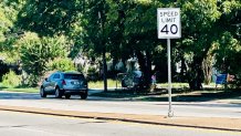 A new speed limit sign is installed on Loop 12 in Dallas, Thursday, Oct. 3, 2024, lowering the speed limit to 40 mph. The change comes after a series of reports by NBC 5 Investigates on the dangerous speeds driven on the roadway.