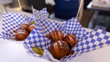 The Hot Chick-in-Pancake Poppers are everything we want from fried food at the State Fair of Texas.(Azul Sordo / Staff Photographer)