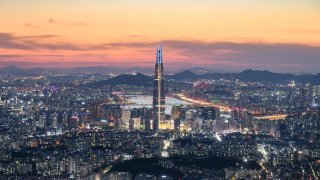 The Seoul skyline at sunset.