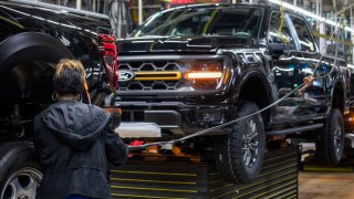 The new Ford F-150 truck goes through the assembly line at the Ford Dearborn Plant on April 11, 2024 in Dearborn, Michigan.