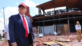 Republican presidential nominee, former U.S. President Donald Trump, listens to a question as he visits Chez What Furniture Store which was damaged during Hurricane Helene on September 30, 2024 in Valdosta, Georgia.