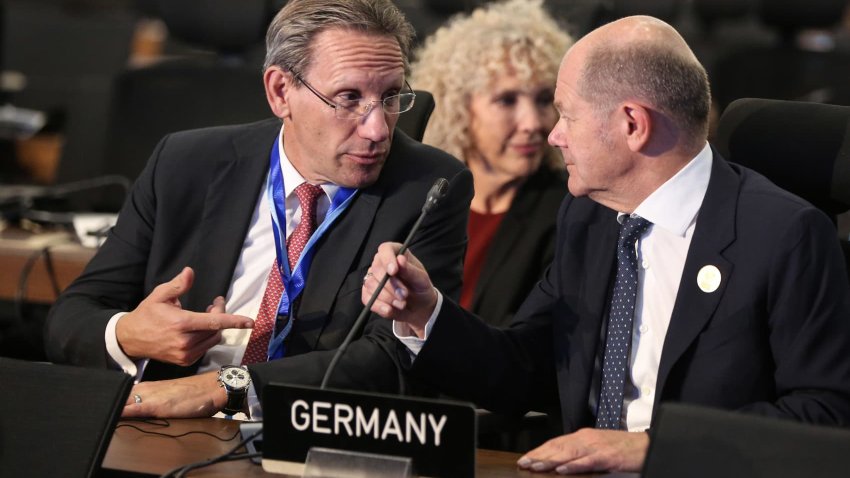 Olaf Scholz, Germany’s chancellor, right, speaks with aide Joerg Kukies at the COP27 climate conference at the Sharm El Sheikh International Convention Centre in Sharm El-Sheikh, Egypt, on Monday, Nov. 7, 2022.