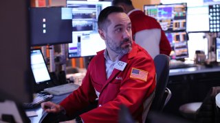 Traders work on the floor of the New York Stock Exchange during the morning trading on November 07, 2024 in New York City. 