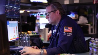 Traders work on the floor of the New York Stock Exchange during the morning trading on November 07, 2024 in New York City. 