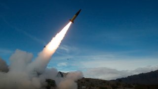 In this image provided by the U.S. Army, soldiers, from the 3rd Battalion, 321st Field Artillery Regiment of the 18th Field Artillery Brigade out of Fort Bragg N.C., conduct live fire testing at White Sands Missile Range, N.M., on Dec. 14, 2021, of early versions of the Army Tactical Missile System.