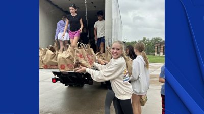 Local students collect more than 3,300 pounds of food, essentials for those in need