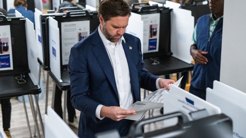 Republican nominee for vice president U.S. Sen. JD Vance (R-OH) looks over his ballot at a polling place on November 5, 2024 in Cincinnati, Ohio.