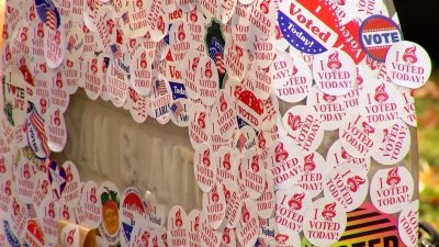 Voters visit Susan B. Anthony grave to place “I Voted” stickers