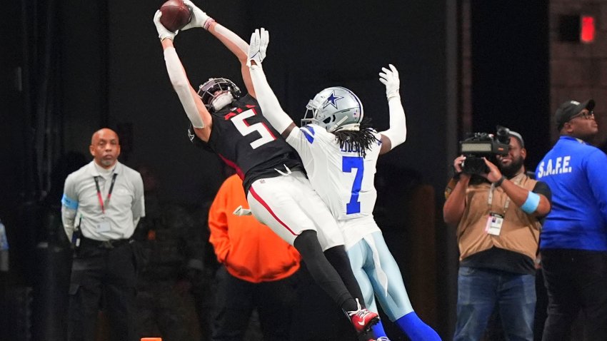 Atlanta Falcons wide receiver Drake London (5) pulls in a touchdown reception against Dallas Cowboys cornerback Trevon Diggs (7) during the first half of an NFL football game, Sunday, Nov. 3, 2024, in Atlanta. (AP Photo/ Brynn Anderson)