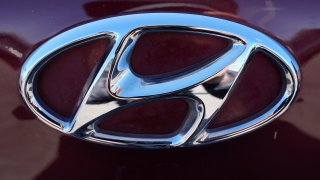 FILE – The Hyundai logo is seen at a new and used vehicles dealership in Palatine, Ill., March 20, 2024.