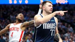 Oct 31, 2024; Dallas, Texas, USA;  Dallas Mavericks guard Luka Doncic (77) reacts after scoring in front of Houston Rockets guard Jalen Green (4) during the second half at American Airlines Center. (Mandatory Credit: Kevin Jairaj-Imagn Images)