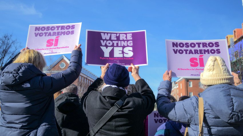 People holding signs