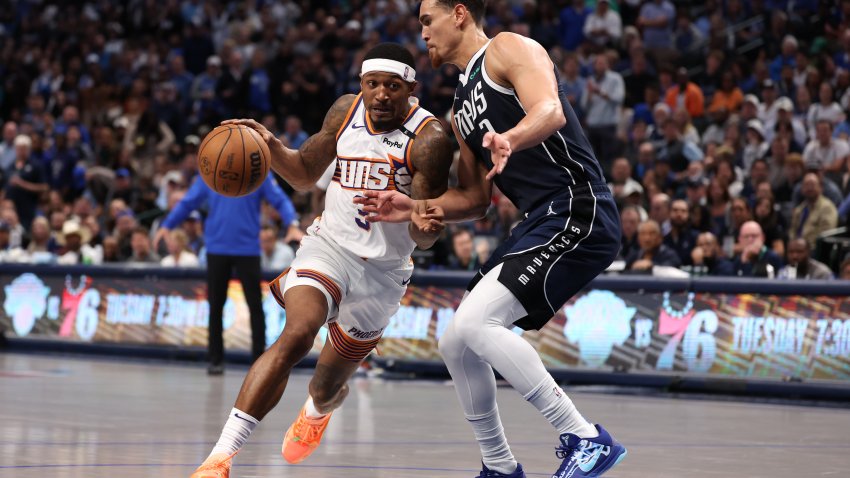 DALLAS, TEXAS – NOVEMBER 08: Bradley Beal #3 of the Phoenix Suns is defended by Dwight Powell #7 of the Dallas Mavericks during the second half at American Airlines Center on November 08, 2024 in Dallas, Texas.