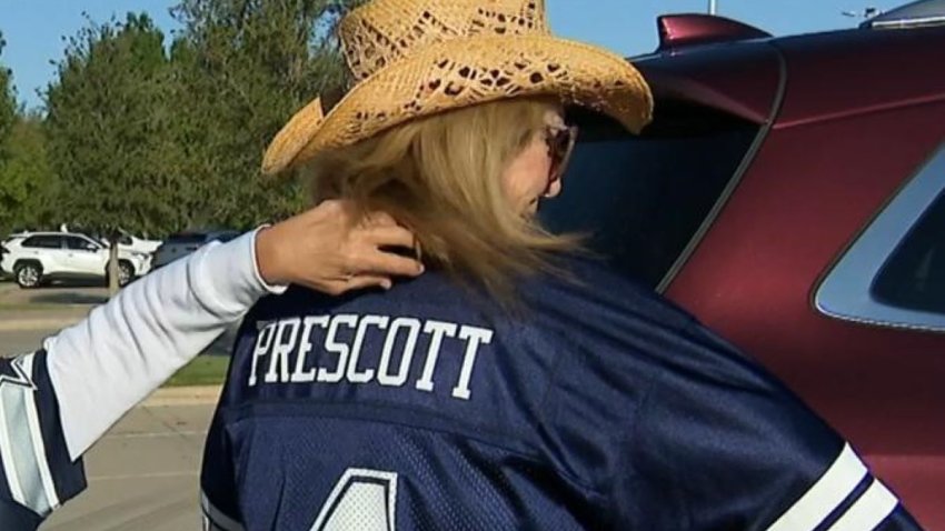 Dak Prescott fan outside AT&T Stadium after receiving news of his possible season-ending surgery. (NBC 5 photo)