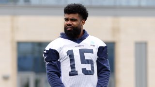 Jun 4, 2024; Frisco, TX, USA; Dallas Cowboys running back Ezekiel Elliott (15) on the field during practice at the Ford Center at the Star Training Facility in Frisco, Texas. (Mandatory Credit: Tim Heitman-USA TODAY Sports)