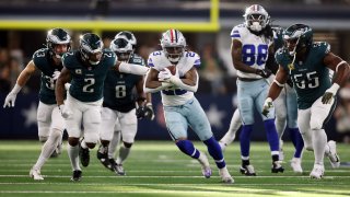 Nov 10, 2024; Arlington, Texas, USA; Dallas Cowboys running back Rico Dowdle (23) runs the ball against the Philadelphia Eagles in the second quarter at AT&T Stadium. Mandatory Credit: Tim Heitman-Imagn Images