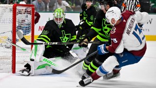 Nov 29, 2024; Dallas, Texas, USA; Dallas Stars goaltender Jake Oettinger (29) stops a shot by Colorado Avalanche right wing Valeri Nichushkin (13) during the third period at the American Airlines Center.