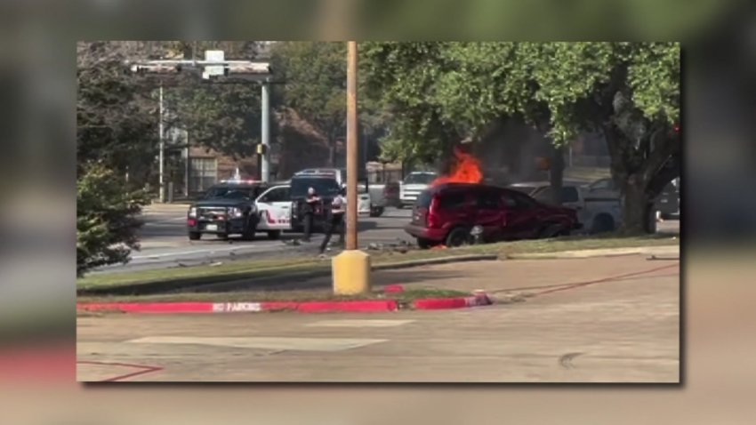 A car catches fire after a crash during a police chase, Wednesday, Nov. 27, 2024.