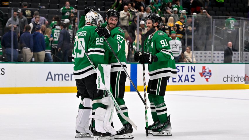 Nov 14, 2024; Dallas, Texas, USA; Dallas Stars goaltender Jake Oettinger (29) and left wing Mason Marchment (27) and center Tyler Seguin (91) celebrate the win over the Boston Bruins at the American Airlines Center. Mandatory Credit: Jerome Miron-Imagn Images