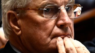 France’s Prime Minister Michel Barnier ponders during a session of questions to the government at the National Assembly in Paris, on December 3, 2024.