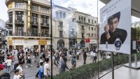 Shoppers pass a Huawei Technologies Co. store on Nanjing East Road in Shanghai, China, on Wednesday, Oct. 2, 2024.  