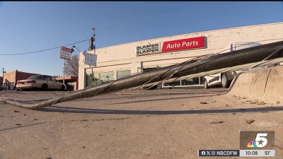 Semi-truck knocks down power lines in Irving