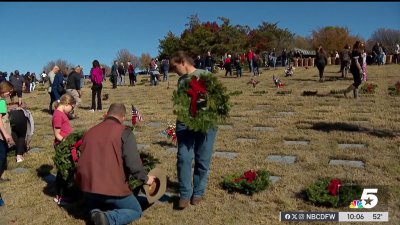 Volunteers gather to lay wreaths in DFW National Cemetery