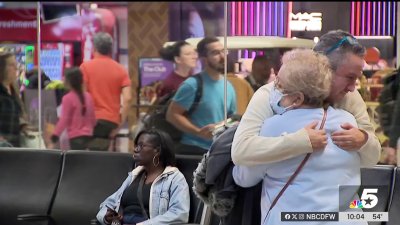 Heartwarming moments captured at DFW Airport as families reunite for the holidays