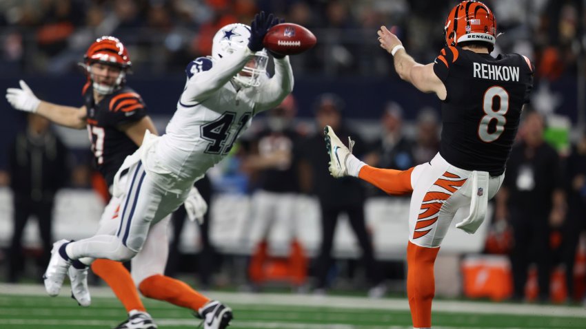 Dallas Cowboys linebacker Nick Vigil (41) blocks a punt by Cincinnati Bengals punter Ryan Rehkow (8) during the second half of an NFL football game, Monday, Dec. 9, 2024, in Arlington, Texas. (AP Photo/Gareth Patterson)