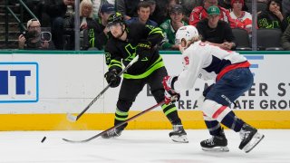 DALLAS, TX – DECEMBER 16: Mavrik Bourque #22 of the Dallas Stars makes a pass to a teammate against the Washington Capitals at the American Airlines Center on December 16, 2024 in Dallas, Texas.